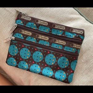 Small carry-all pouch with 3 pockets